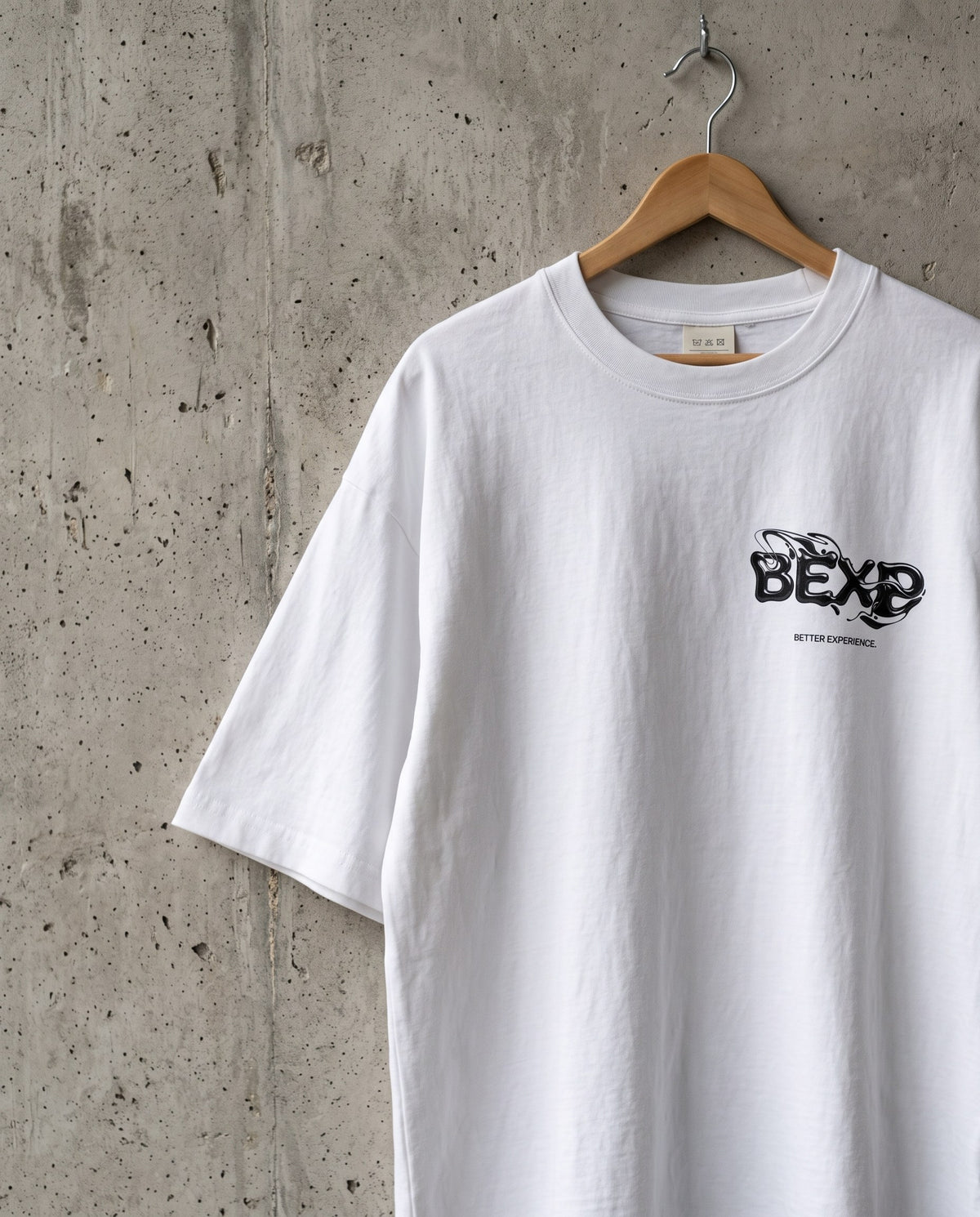 BEXP — Liquid Mark Tee