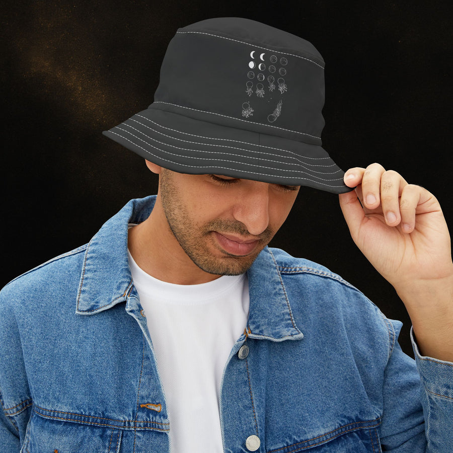 Model wearing BEXP Octopus bucket hat with moon phases design
